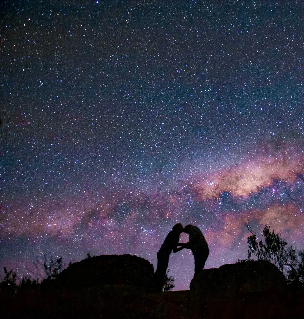 Couple silhouetted against the Milky Way at Bliss and Stars off-grid couples retreat, Cederberg