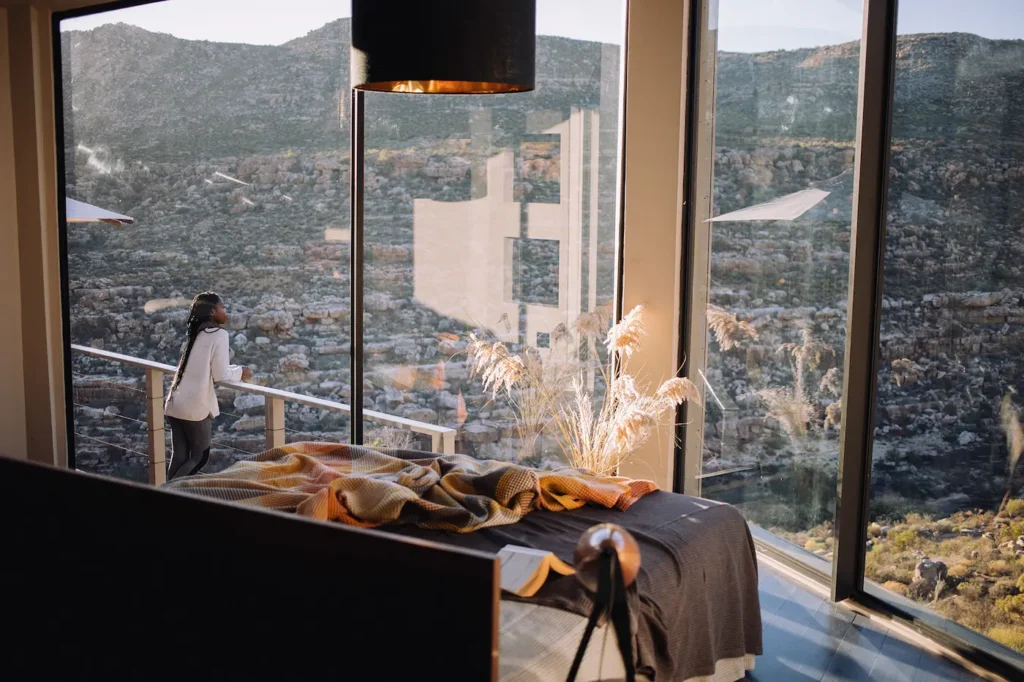 Chalet bedroom with floor-to-ceiling Cederberg views at Bliss and Stars Bloom retreat, Western Cape, South Africa